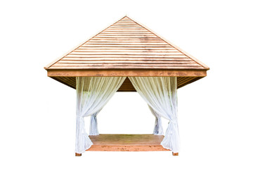 Wooden shelter with white curtain