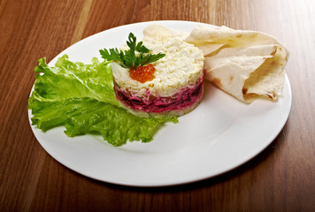 Fototapeta na wymiar Salad with salmon