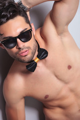 Naklejka premium topless young man cutout portrait