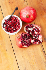 Delicious fresh pomegranate fruit on table