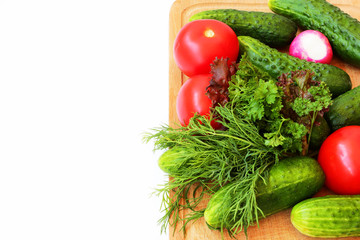 heap of vegetables on a wooden board