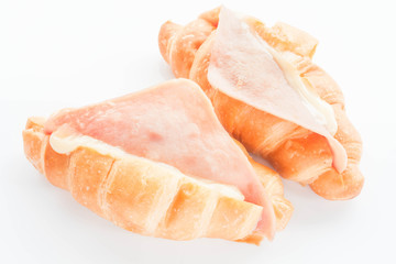 Couple of mini ham cheese croissants isolated on white backgroun