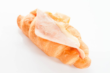 Croissant filling with ham cheese isolated on white background