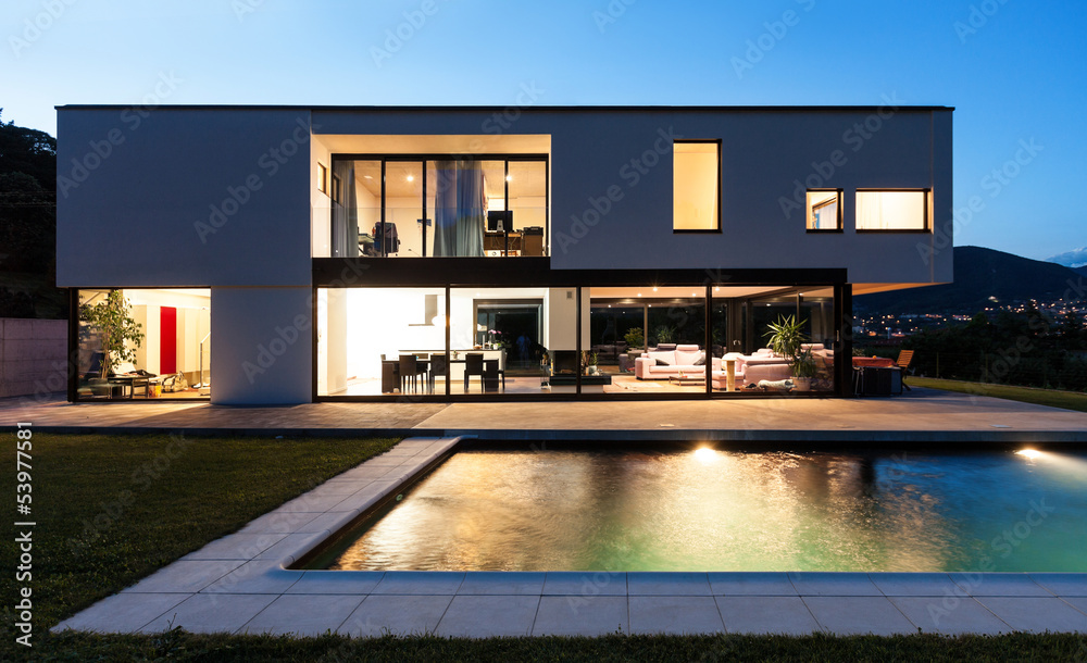 Wall mural modern villa with pool, night scene