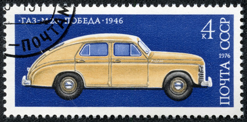 stamp printed in USSR shows a passenger car