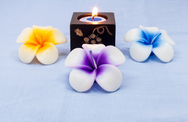 Fototapeta na wymiar Aroma candles for spa and flowers.