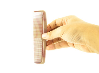 Fototapeta na wymiar hand holding comb
