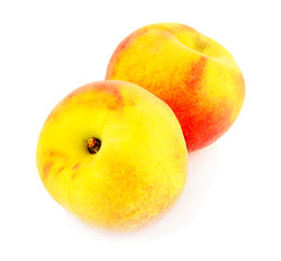 Ripe sweet peaches, isolated on white