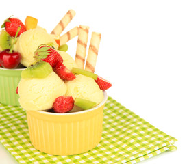 Delicious  ice cream with fruits and berries in bowl isolated