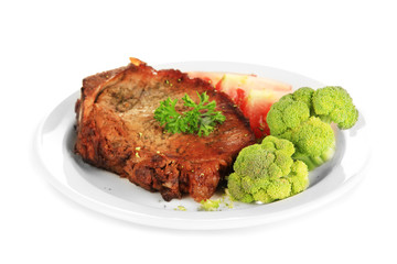 Piece of fried meat on plate isolated on white