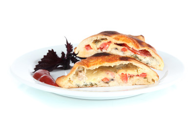 Pizza calzone on plate isolated on white