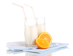 Delicious milk shakes with orange isolated on white
