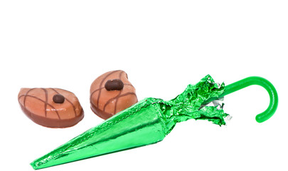 Three delicious chocolate candies isolated on white