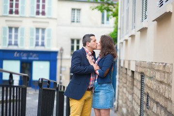 Couple kissing on the street