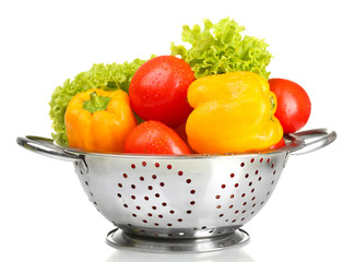 fresh vegetables in silver colander isolated on white © Africa Studio