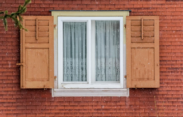 Fototapeta na wymiar Traditional window from Austria at winter