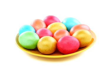Fototapeta na wymiar Easter colored eggs on a plate.