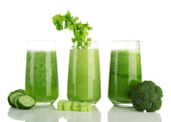 Glasses of green vegetable juice, isolated on white