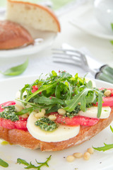 Ciabatta with tomato, mozzarella and rocket saladс.