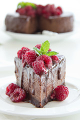 Chocolate cheesecake with raspberries.