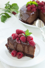 Chocolate cheesecake with raspberries.