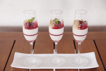 Delicious panna cotta dessert mixed berry .