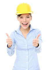 Female Architect Gesturing Thumbs Up