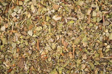 Dried marjoram spice closeup as food background