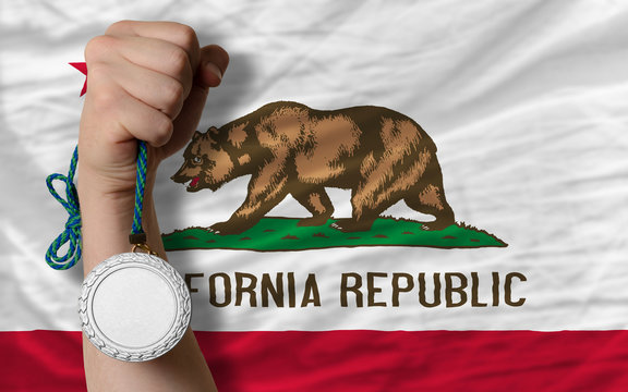 Silver medal for sport and flag of american state of california