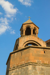 Fototapeta na wymiar Right колокольна a cathedral of Echmiadzin against the sky