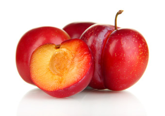 Ripe plums isolated on white