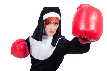 Nun with boxing gloves isolated on white