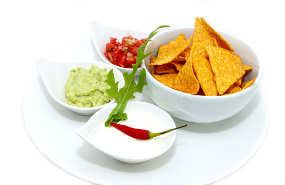 Mexican food dishes at the restaurant on a white background
