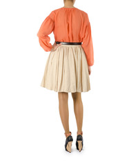 Woman in fashion dress concept on white