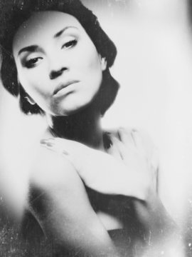 Grungy female portrait with soft focus lens