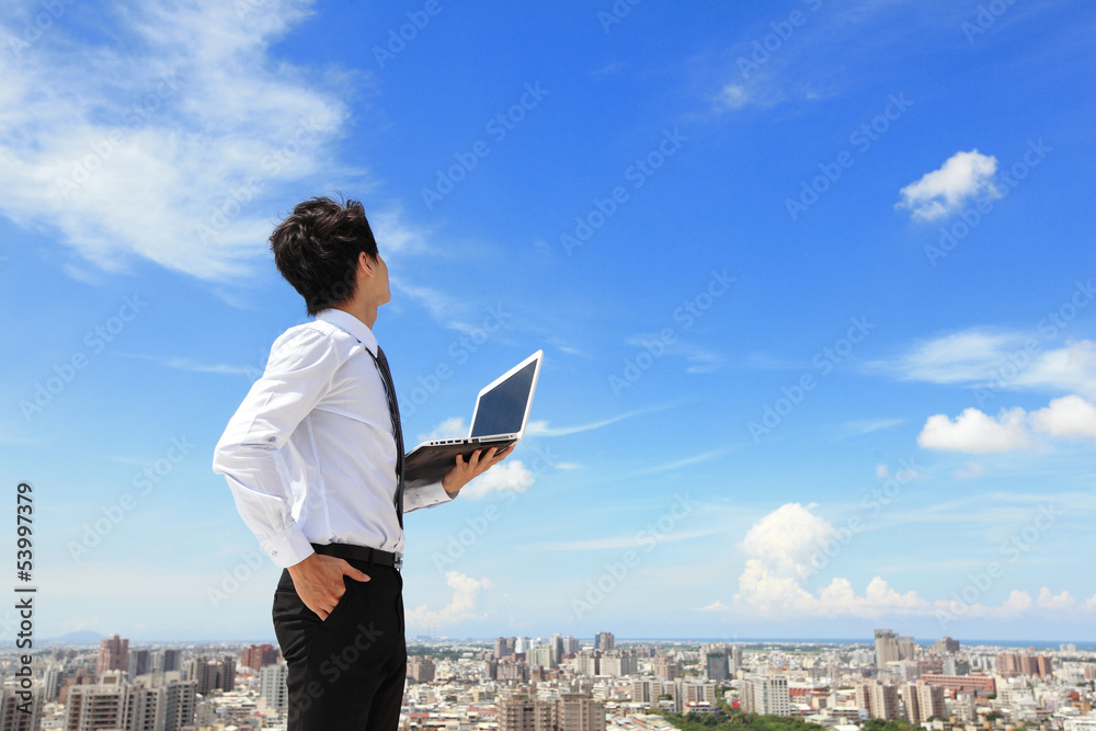 Poster business man with laptop and look sky and cloud