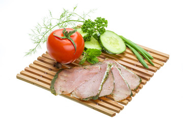 Ripe fresh ham with vegetables