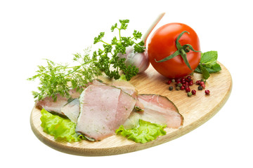 Ripe fresh ham with vegetables