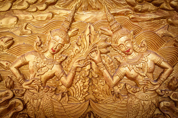 Pattern of half-bird half-woman carved