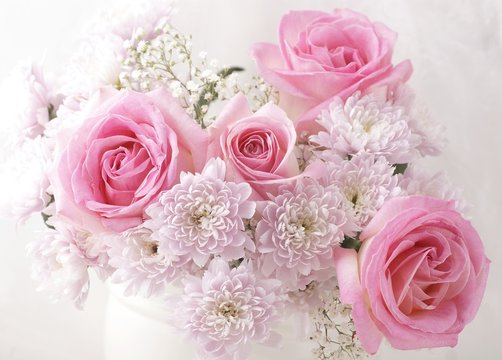Pink and white flowers in a vase.