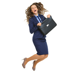 Full length portrait of business woman with briefcase jumping