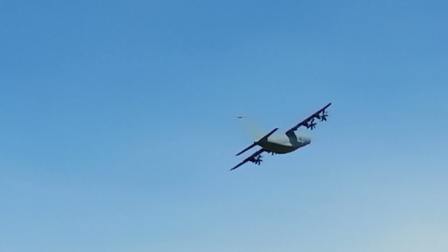 Freight carrier AN-70 flying over camera on air show