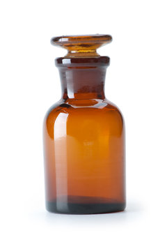 Small chemical glass bottle on white background