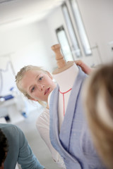 Fototapeta premium Student girl working on pattern