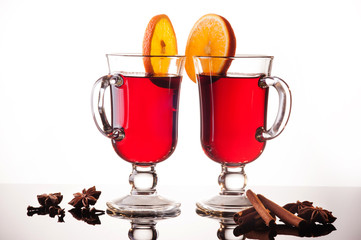 Mulled wine in two glasses on white