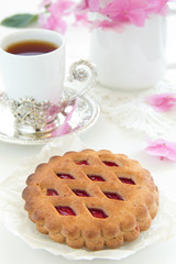 Biscuits with strawberry jam.