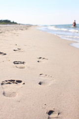 stopy na piasku