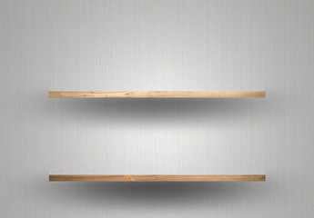 Empty wood shelf on wall