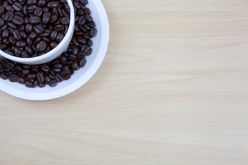Cup of coffee on a wooden surface