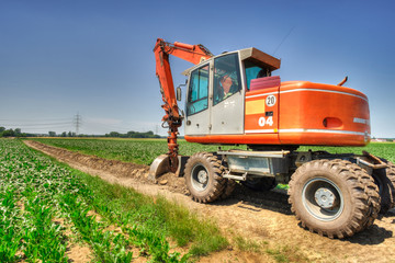 Obraz premium bagger im feld hdr